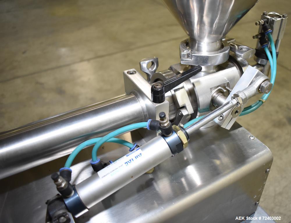 Used Wenzhou Rigao Table Top Semi Automatic Piston Filler, Model DYF. 316L Stainless steel product contact. Filling speed 5 to 20 bottles per minute. Filling accuracy /= 1% +/-. Filling range: approx...
